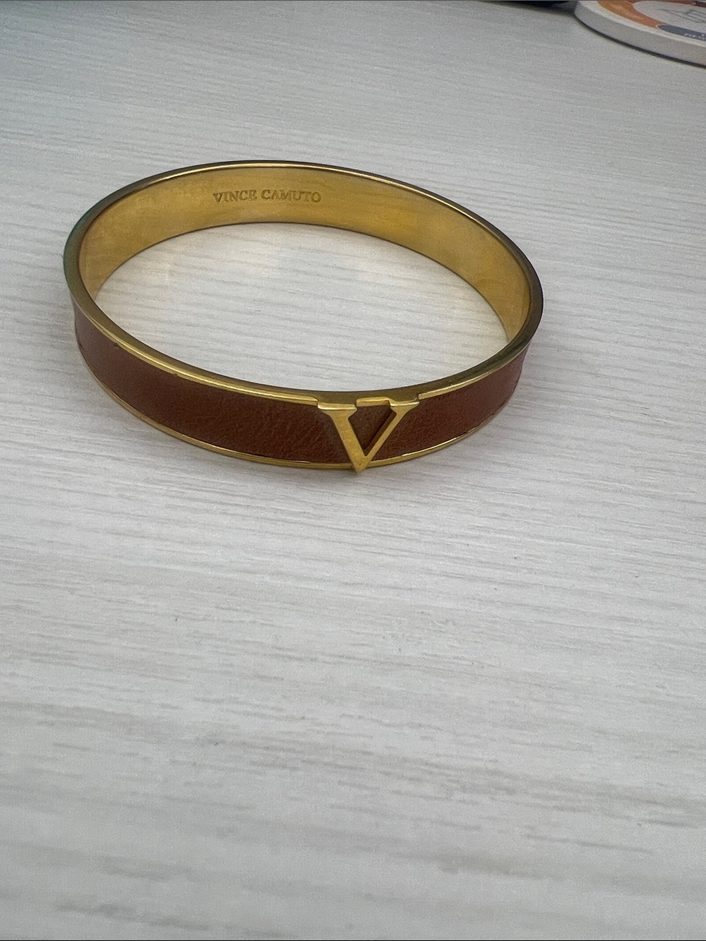 Vince Camuto Gold-Tone Bangle with Brown Leather Inlay and V Logo